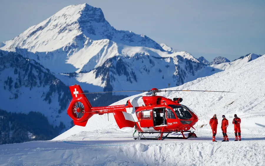 A helicopter on the snow in the Everest region